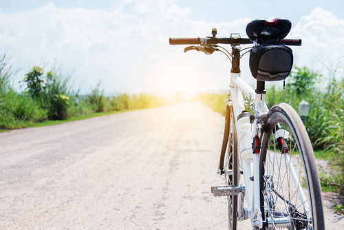 bicycle-rural-road-with-grass-sunset-countryside-thailand bicycle-rural-road-with-grass-sunset-countryside-thailand